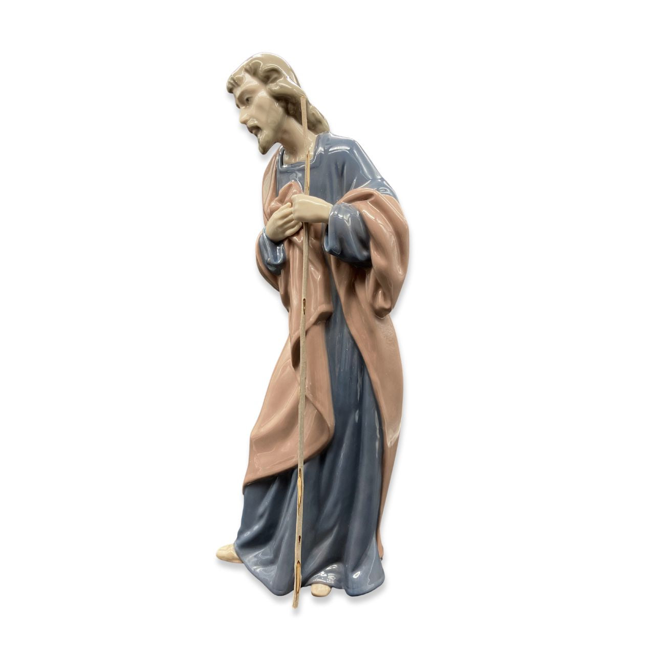 Nao by Lladro Saint Joseph Nao porcelain figurine “Saint Joseph” from the Christmas Collection. Sculpted by Salvador Furió, this figurine is part of the nativity set. Nao Porcelain Figurines are produced in Valencia Spain and the Company is part of the Lladro family. Each piece is lovingly handmade and hand painted by the Valencia Artisans.