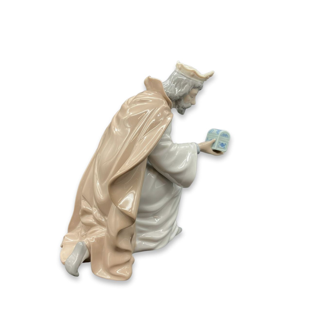 Nao by Lladro King Melchior With Chest Wisemen Nao porcelain figurine “King Melchior With Chest” from the Christmas Collection. Sculpted by Regino Torrijos, this figurine is part of the nativity set.