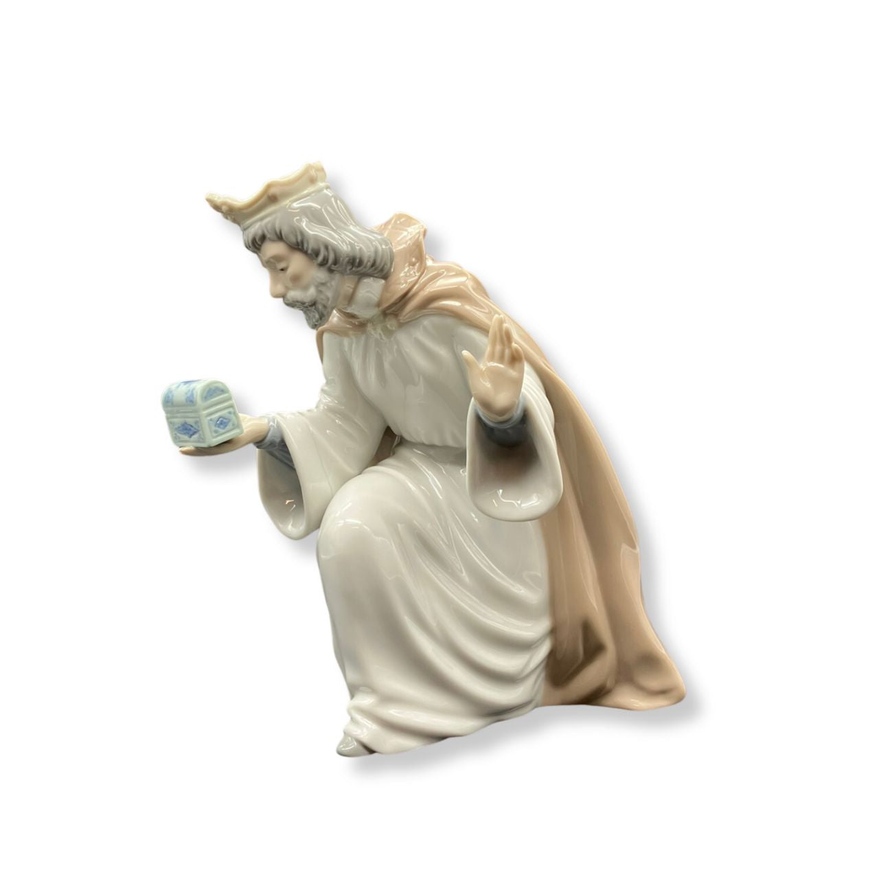 Nao by Lladro King Melchior With Chest Wisemen Nao porcelain figurine “King Melchior With Chest” from the Christmas Collection. Sculpted by Regino Torrijos, this figurine is part of the nativity set.