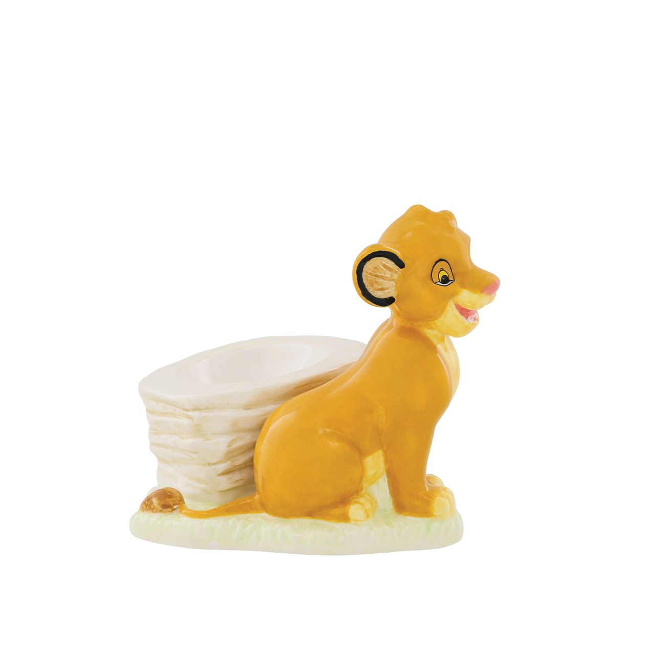 This beautiful ceramic Simba egg cup is certainly a collector's piece. Put your boiled egg in the rock next to Simba and crack it open for some breakfast fun. When it's not in use, the New King will certainly add a decorative flourish to any kitchen shelves. Perfect functional gift or self-purchase for any Disney fan.