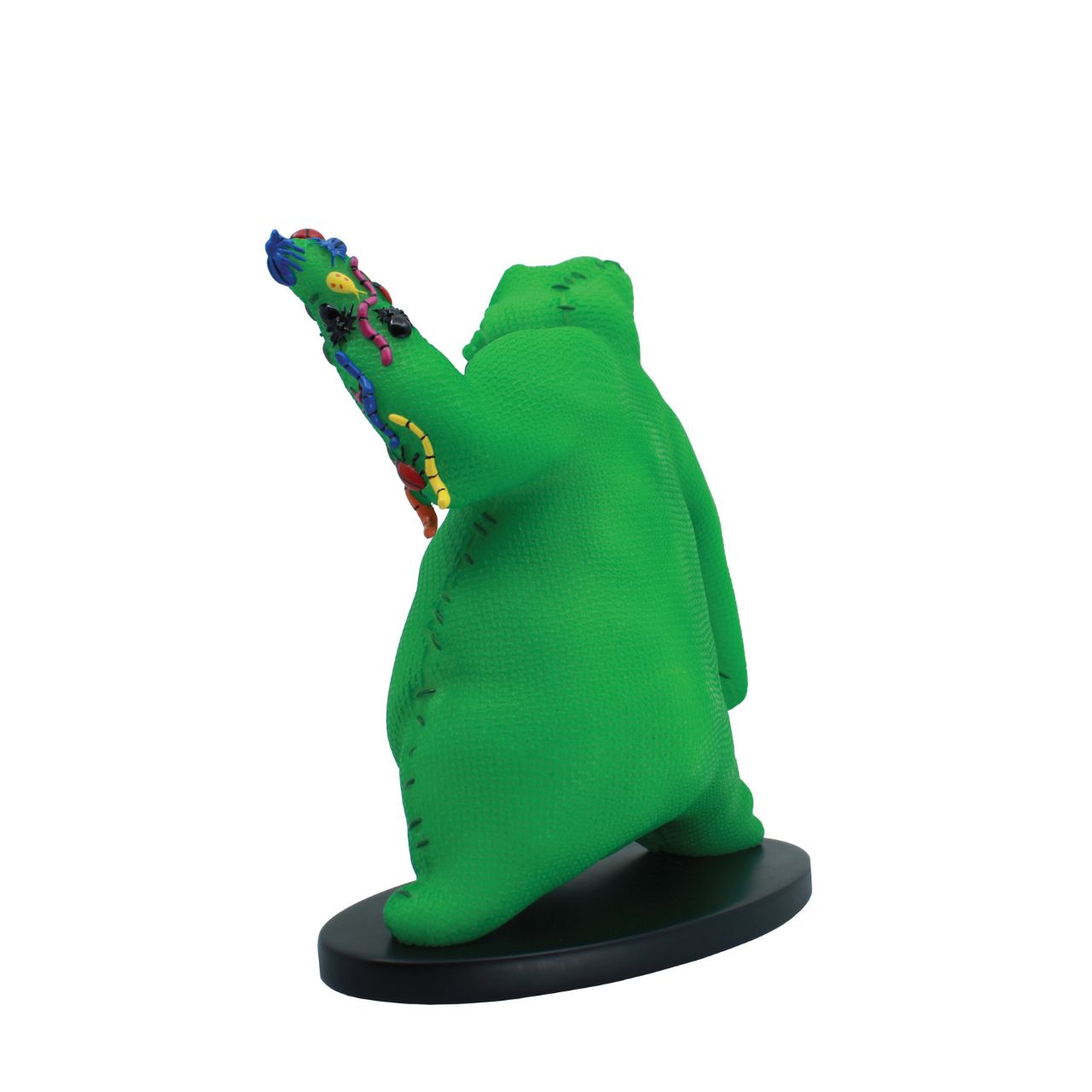 Imagine bringing home a piece of haunting magic with this Oogie Boogie glow-in-the-dark figurine. Every night will be full of delightful frights as Oogie Boogie, will let his ghostly glow add a touch of Halloween magic to your everyday.