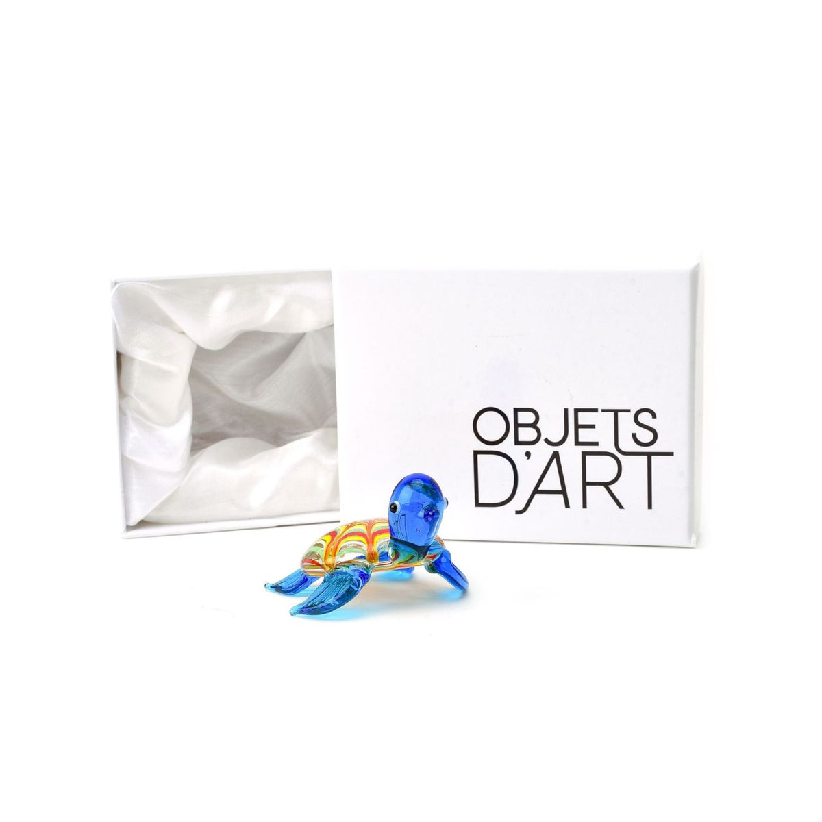 A beautifully elegant handmade glass ornament. From Objets d'Art by SOPHIA - hand blown