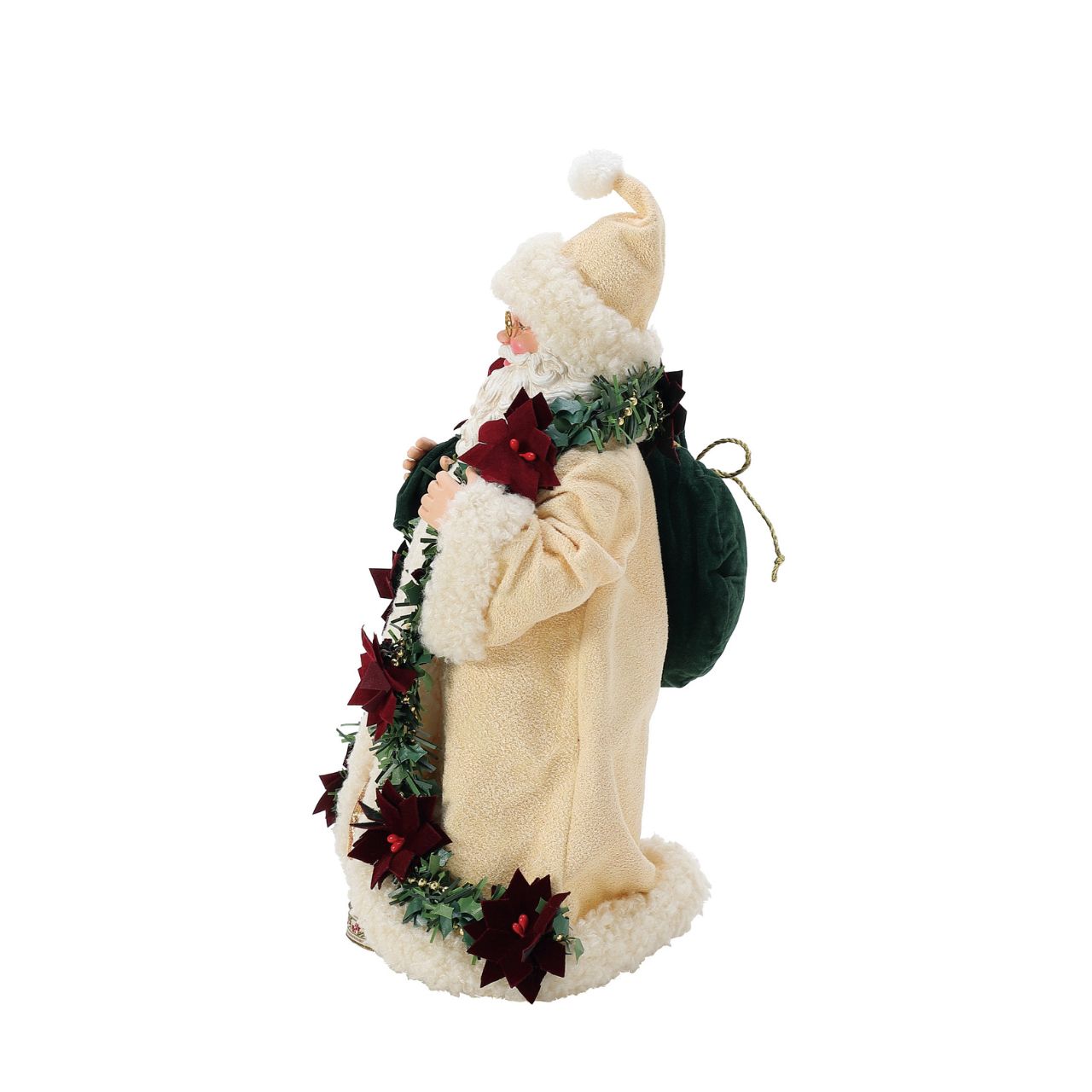 Poinsettia accents are the star of Santa Claus's old world attire. They add just the right splash of red to his golden ribbon trimmed gown. Designed by Enesco's very own Department 56, each Possible Dreams figurine is finished with a brass tag for authenticity and made using "clothtique" - a stiffened fabric, to ensure quality for generations.