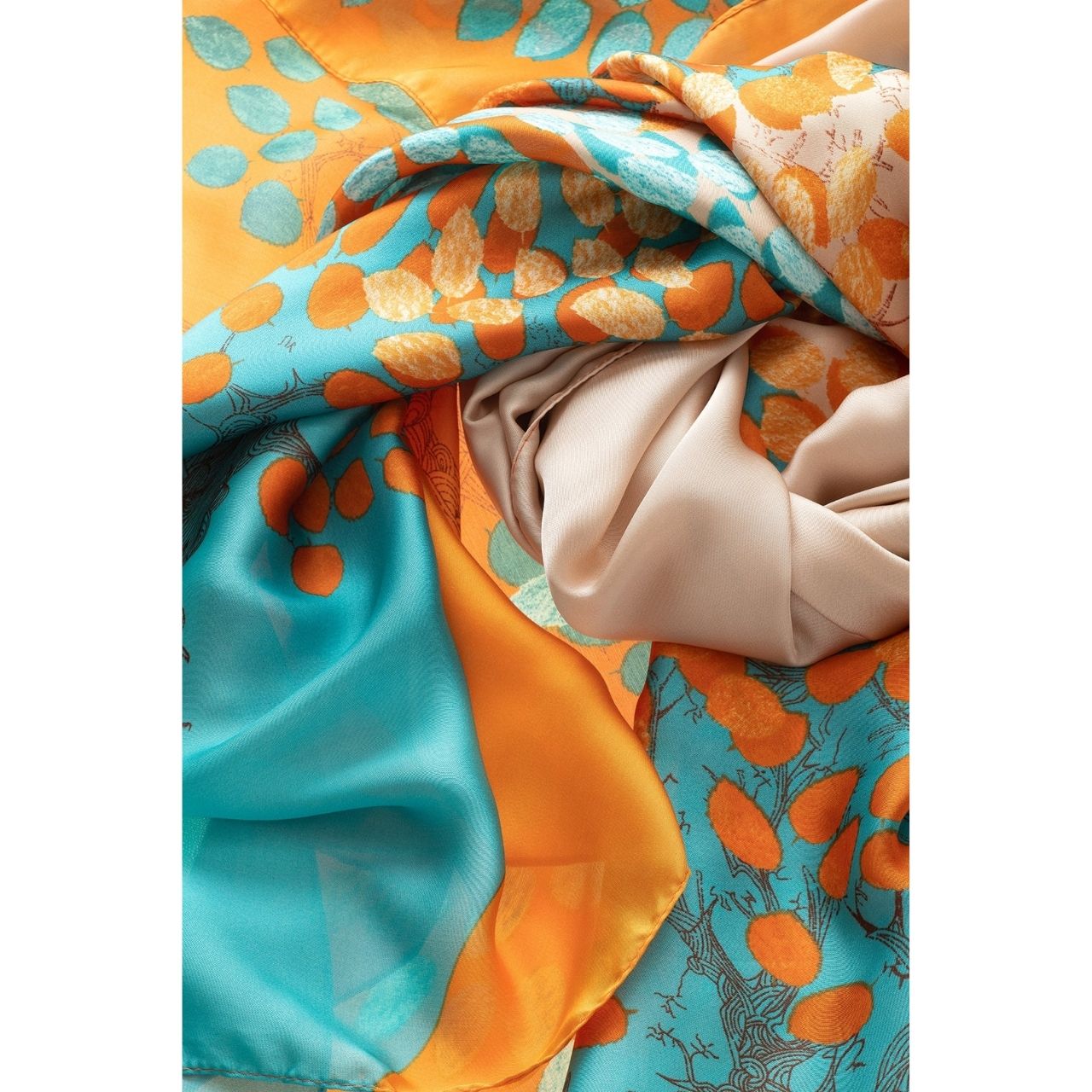 Orange & Turquoise Polyester Scarf by Galway Crystal  Our Orange & Turquoise Polyester Scarf is the perfect rich colour that will draw attention and complement any outfit. This rich, soft and comfortable scarf is a must have and also comes in a beautiful box ready for gifting. A touch of luxury for everyday life and perfect for all seasons.