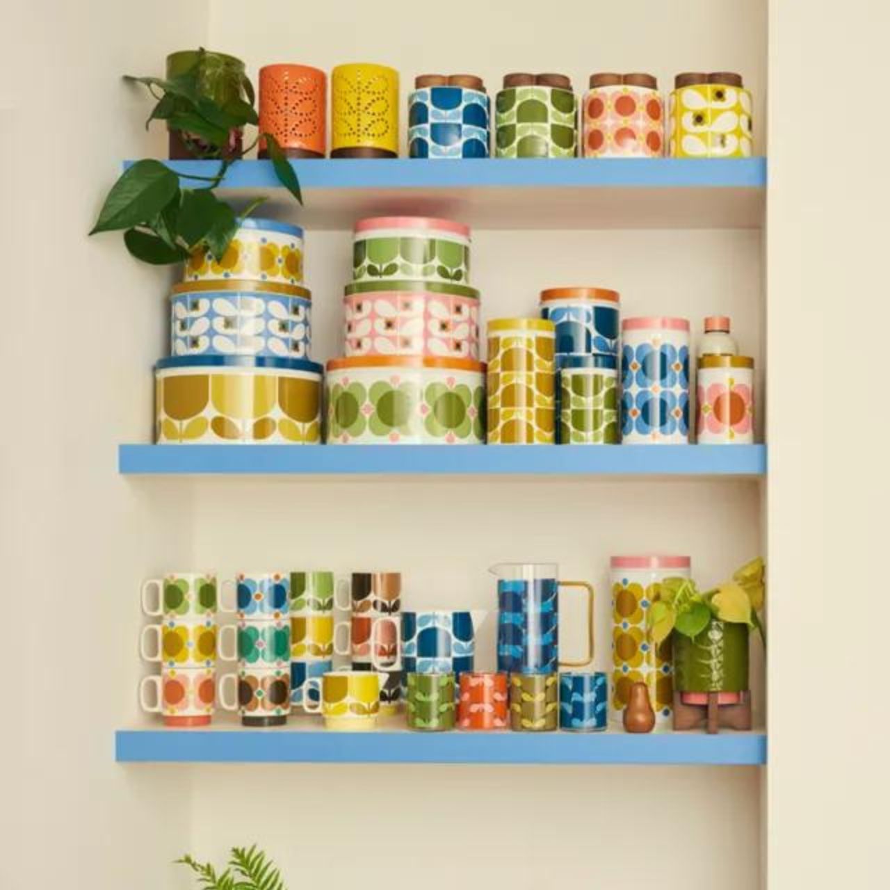 Orla Kiely Nesting Canister Tins - Set of 3 Block Flower  From one the world's top fashion designers Orla Kiely, comes these set of three metal storage canisters in her Block Flower design. A great addition to any kitchen counter top with their bright and so recognisable colour pallet.
