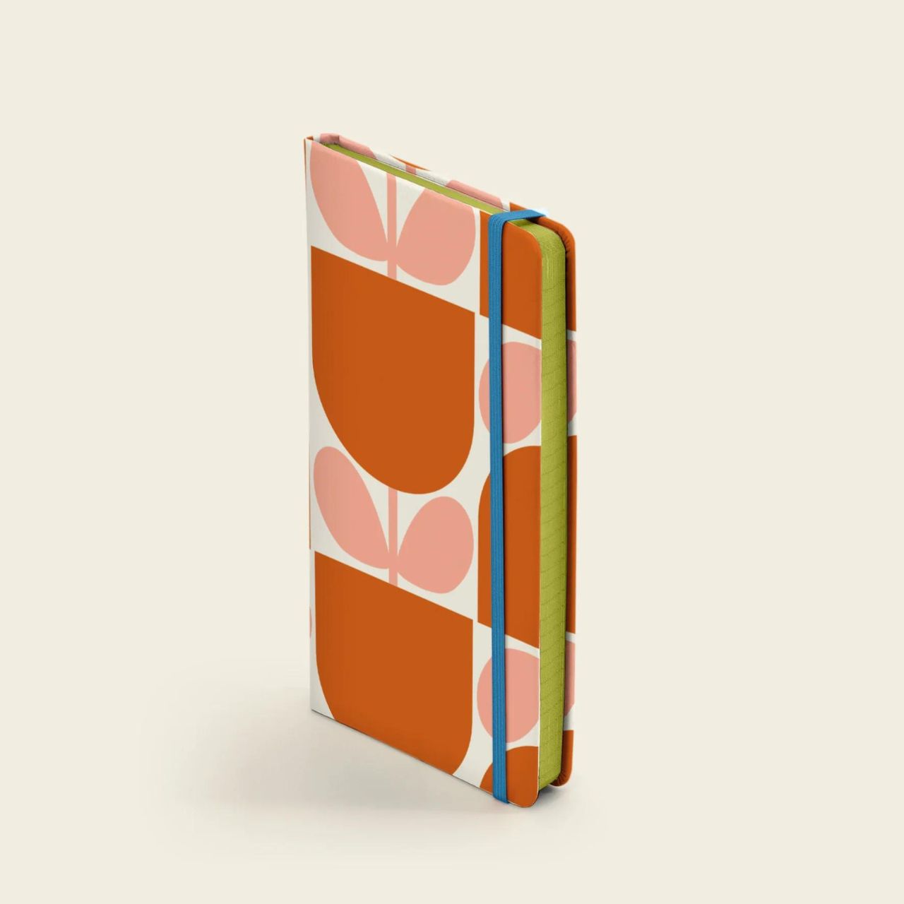 Orla Kiely Block Tulip Small Notebook  Write down your goals, plans and your weekly shopping list in style with our Block Flowers notebook. This notebook has a hardcover with rounded corners, an elastic closure and matching ribbon bookmark. Comes with a lined paper layout and expandable inner back pocket.