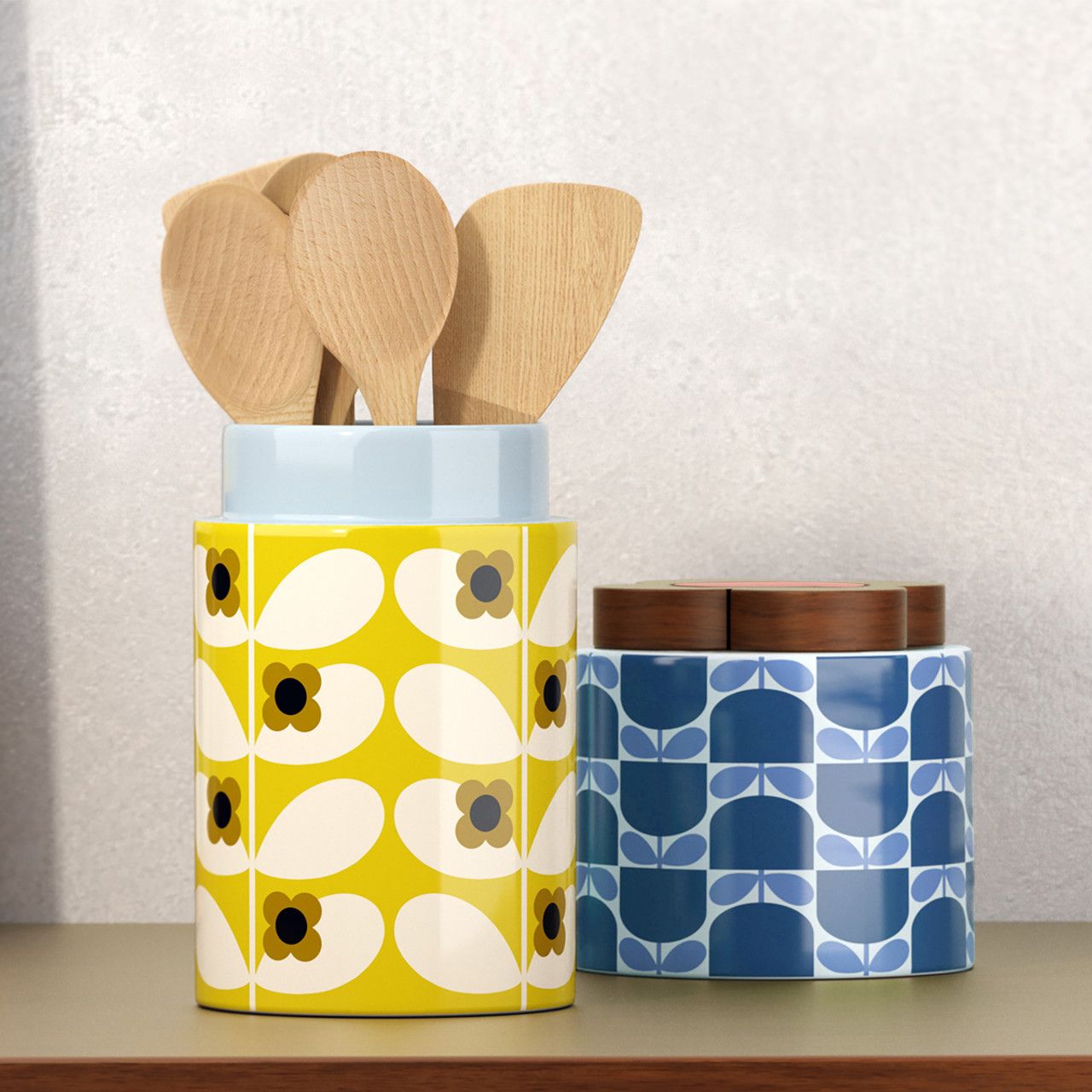 Orla Kiely Wild Rose Stem Dandelion Utensil Pot  Bring a burst of colour to your home with this utensil pot from Orla Kiely.  Designed in the UK by Orla Kiely. This utensil pot is used to store kitchen utensils such as wooden spoons, spatulas and tongs, 1.75 Litre capacity.