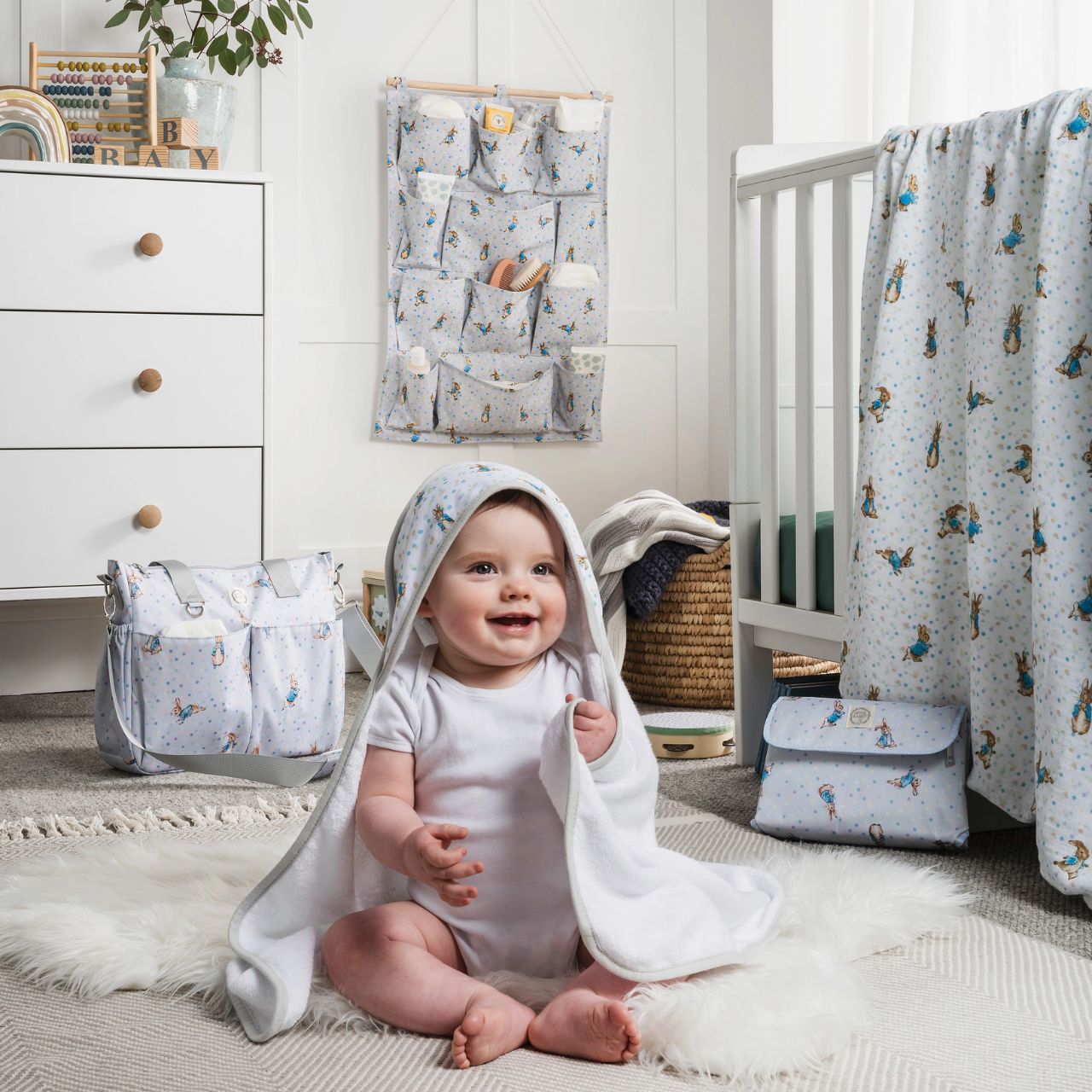 The most adorable hooded Peter Rabbit Towel that you ever did see. This Hooded bath Towel and is for keeping your little one wrapped up warm and snug after bath-time. Made from an ultra-soft and cosy bamboo cotton, terry fabric (70% cotton and 30% bamboo) and Peter Rabbit artworks on the hood.
