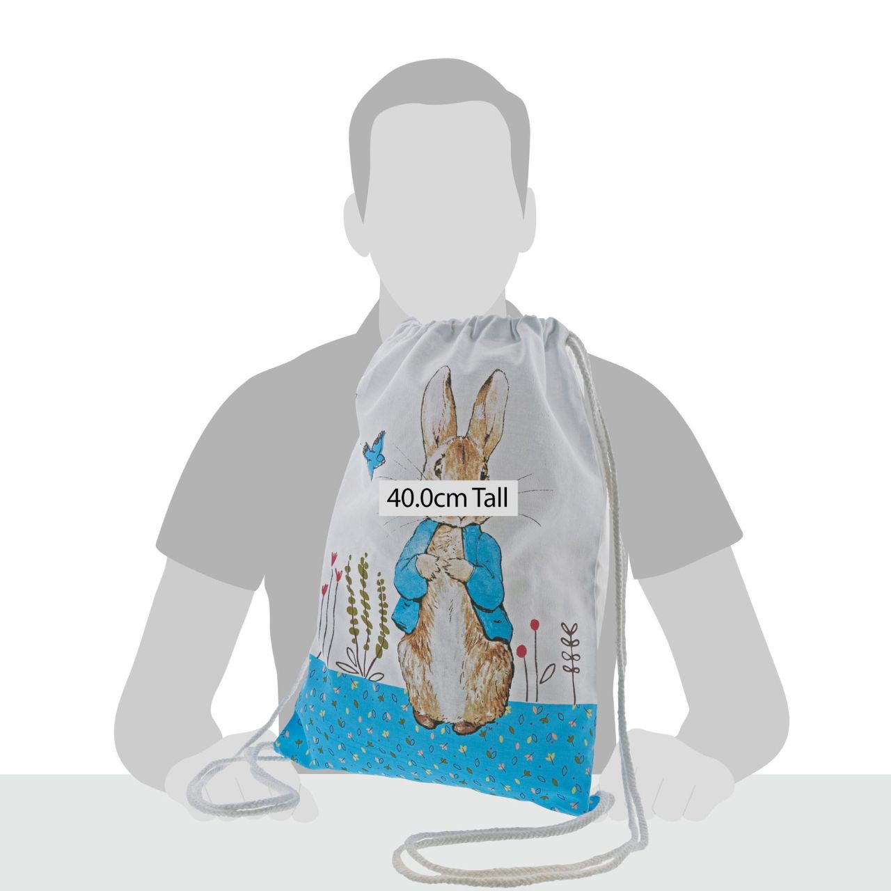 Beatrix Potter Peter Rabbit Drawstring Bag A beautiful Peter Rabbit cotton drawstring bag. This is a lovely little bag that would make a perfect nursery, or pre-school bag for your child to pop all their school essentials in. It is also a great alternative to a storage bag to place all your little one's toys in, and of course an easy way to take their much loved Peter Rabbit teddies everywhere they go.