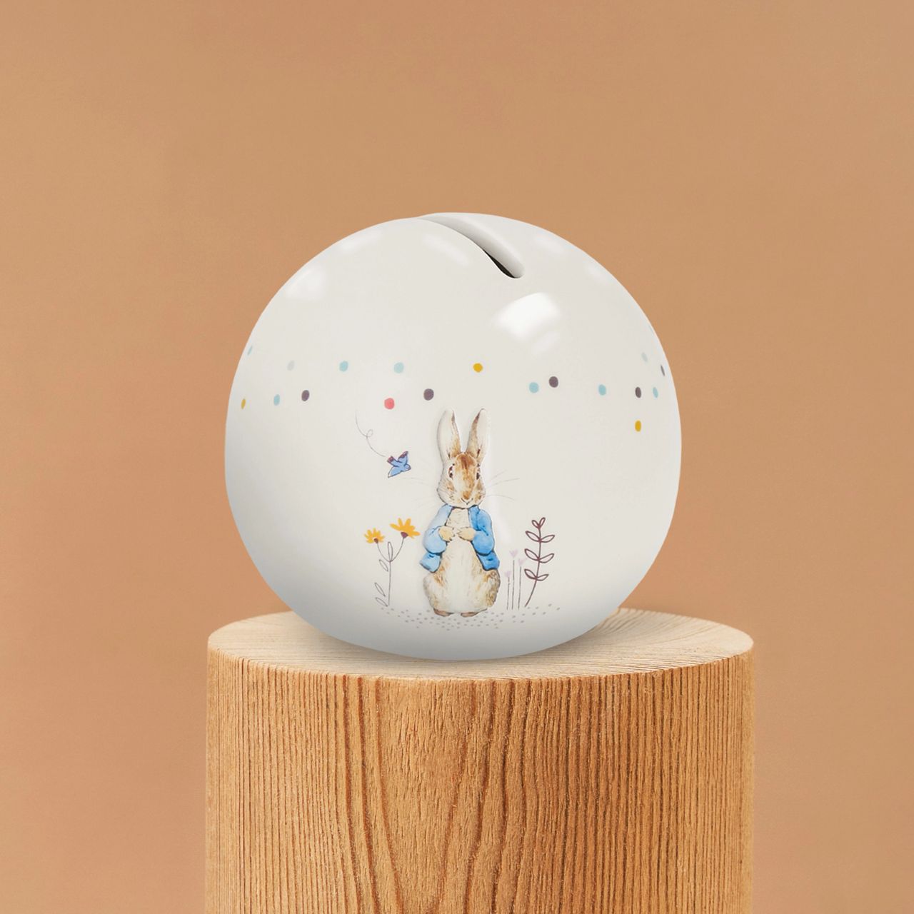 Delight your customers with our exquisite Peter Rabbit Money Bank, a must-have addition for any retail collection featuring beloved literary classics. Crafted from high-quality materials, this charming piece showcases beautifully embossed character artwork, bringing Beatrix Potter's iconic illustrations to life with intricate detail and vibrant colour.