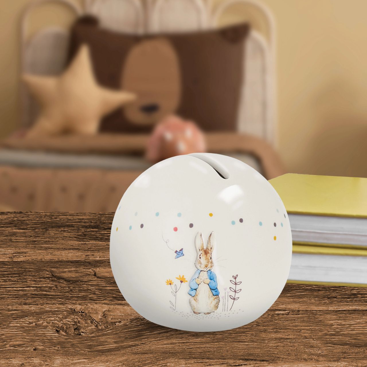 Delight your customers with our exquisite Peter Rabbit Money Bank, a must-have addition for any retail collection featuring beloved literary classics. Crafted from high-quality materials, this charming piece showcases beautifully embossed character artwork, bringing Beatrix Potter's iconic illustrations to life with intricate detail and vibrant colour.