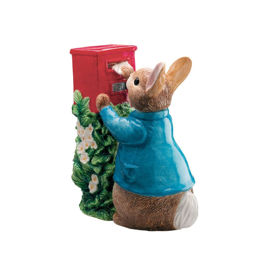 Beatrix Potter Peter Rabbit Posting a Letter Money Bank  A beautiful ceramic Peter Rabbit money bank, perfect for storing your pennies. The artwork is taken from the original illustrations from the Beatrix Potter stories. This Peter Rabbit money bank is sure to make a wonderful gift and comes presented in a branded gift box.