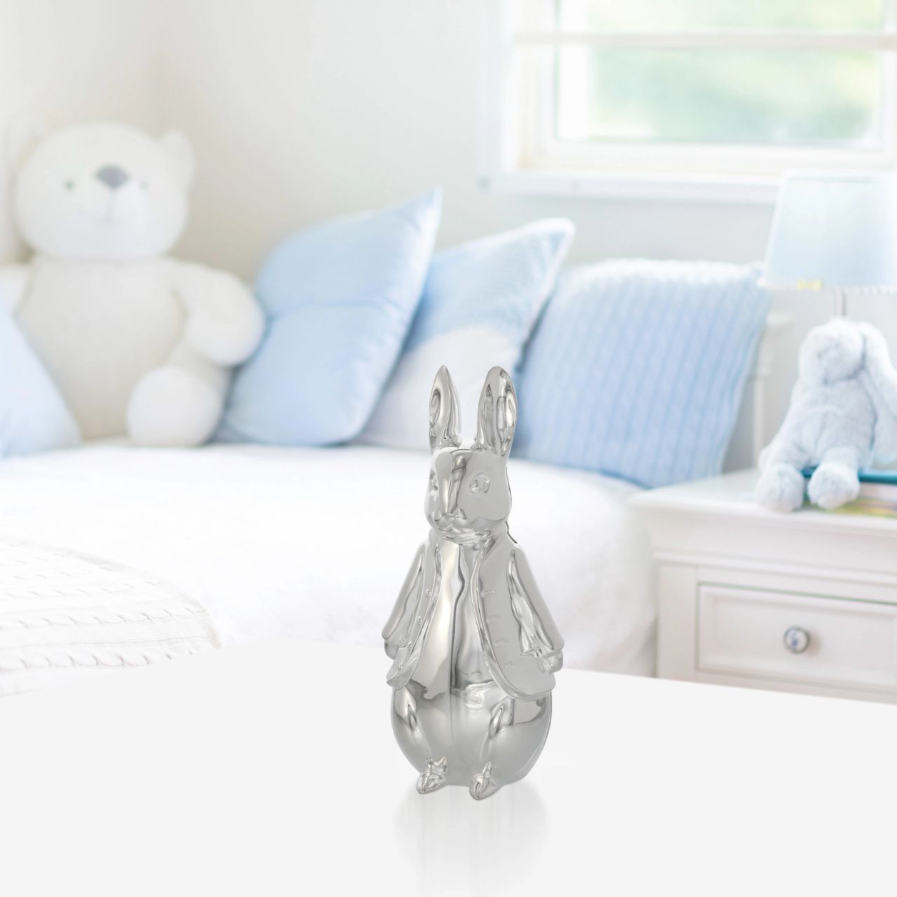 Celebrate a new bundle of joy with the Beatrix Potter New Baby collection. The silver-plated sculpted money bank makes a fantastic gift to store coins and to display in a nursery. With a detailed 3D Peter Rabbit design it will become a treasured possession for new parents and make a beautiful statement piece in a nursery.