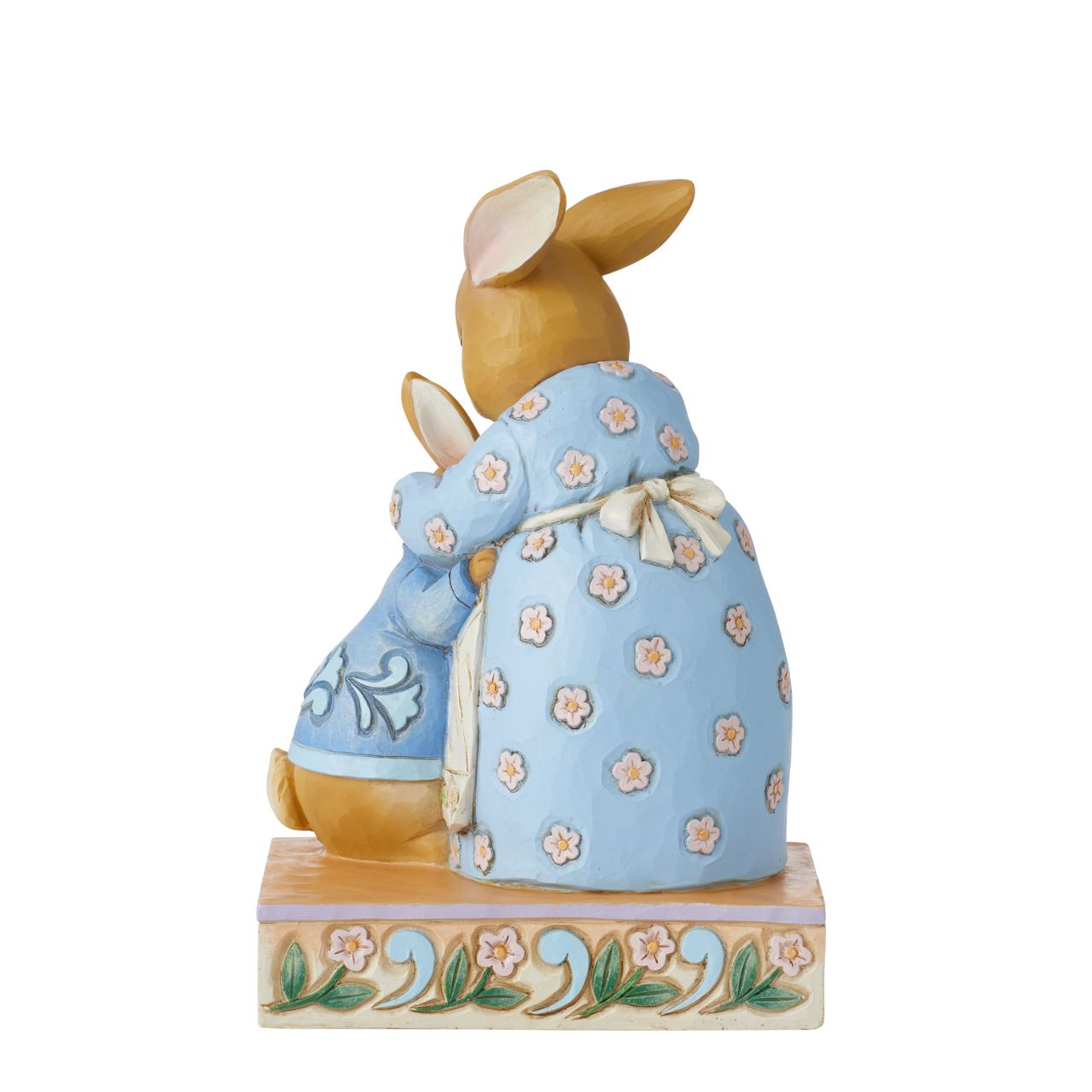 Beatrix Potter Peter Rabbit with Mrs Rabbit Figurine  Jim Shore uplifts the treasured children's characters in this darling miniature. Beloved bunny, Peter Rabbit, melts into his mother's caring embrace. Holding her sweet boy close, she provides all the encouragement he needs for a day of adventuring.