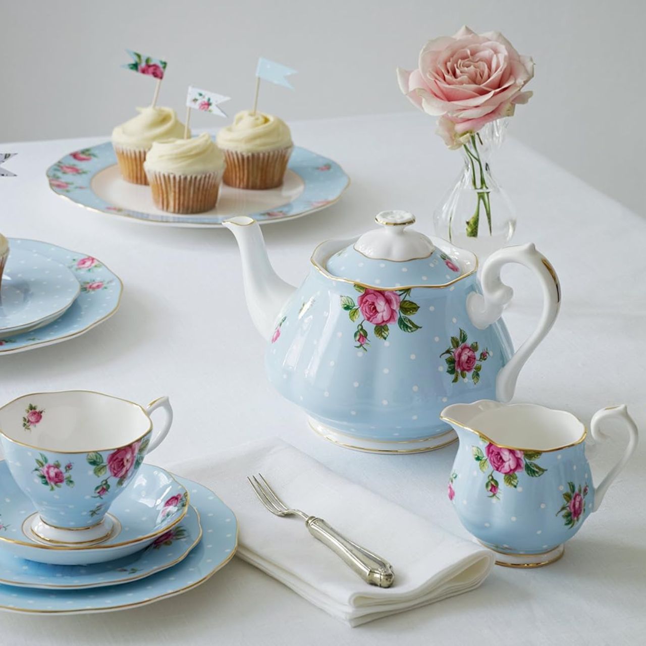 vintage patterns that have made Royal Albert famous the world over. Youthful and exuberant, this beautiful Polka Blue sugar & creamer, all charmingly fashioned in fine bone china and combining classic form with intricate detailing, vibrant colours and a lustrous gold rim.