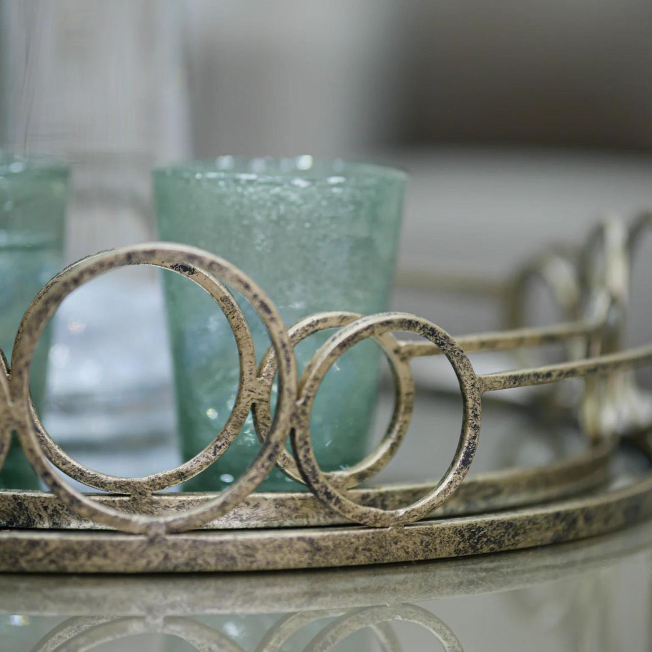 Mindy Brownes Remy Trays Set of 2 Set of two mirrored trays, Serve your drinks or nibbles in style on this deco mirror tray. Beautifully constructed from glass and metal, it's sure to make an impact. Antique gold in finish.