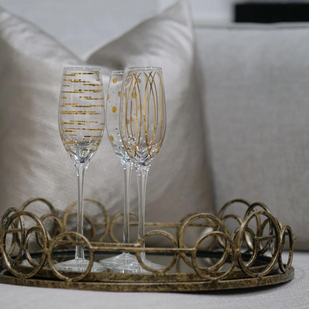 Mindy Brownes Remy Trays Set of 2 Set of two mirrored trays, Serve your drinks or nibbles in style on this deco mirror tray. Beautifully constructed from glass and metal, it's sure to make an impact. Antique gold in finish.