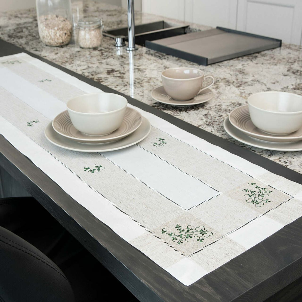 Kinsale Shamrock Table Runner 14" x 72" by Samuel Lamont Lets bring the luck of the Irish to the table! Our stunning embroidered Kinsale Shamrock range features a variety of elegantly designed table textiles to sure bring a splash of green to your home.