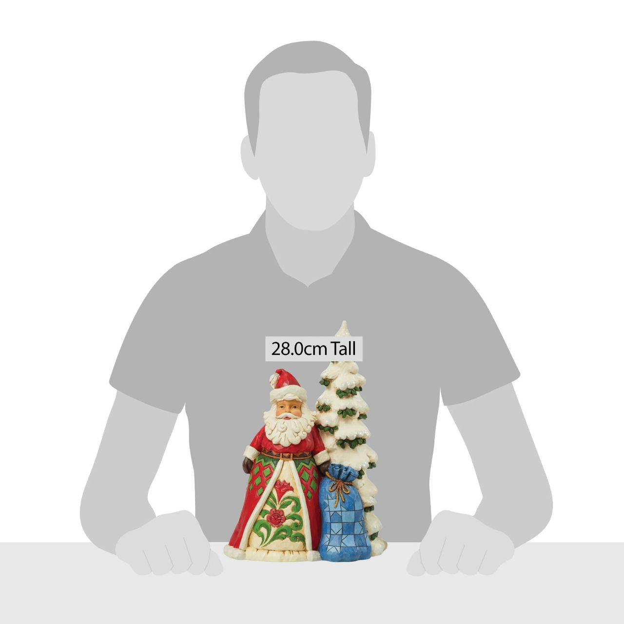 Heartwood Creek Santa by Tree with Toy Sack Figurine Designed by award winning artist Jim Shore as part of the Heartwood Creek Christmas Collection, hand crafted using high quality cast stone and hand painted, this Santa by tree is perfect for the Christmas season.