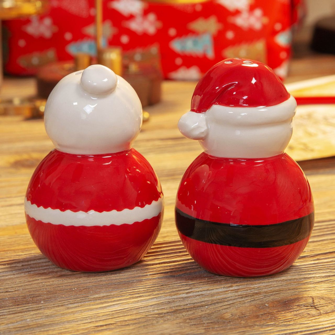 Christmas Santa & Mrs Claus Salt & Pepper Shakers Bring some extra festive cheer to the Christmas dinner table with these hand painted ceramic Santa & Mrs Claus salt & pepper shakers. From the North Pole Novelties Co. by Santa's Workshop - the one stop shop for Christmas cheer!