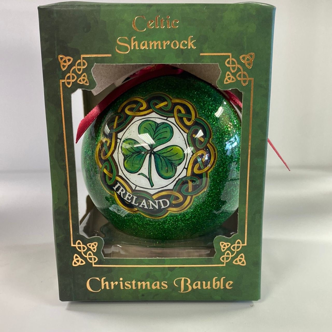 Experience the luck of the Irish this holiday season with our Shamrock Christmas Bauble. This bauble features a beautiful shamrock design, bringing a touch of Celtic charm to your Christmas tree. Perfect for those with Irish heritage or anyone looking for a unique holiday decoration.
