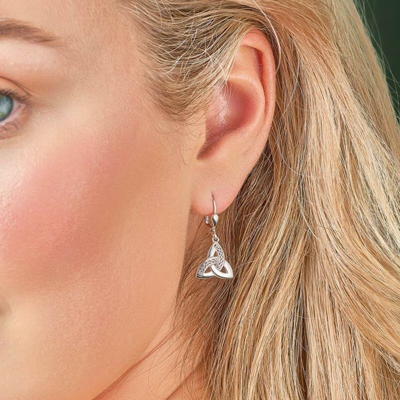 Sterling Silver Trinity Knot Drop Earrings by Solvar These precious sterling silver drop earrings feature the iconic Trinity Knot, and have been Irish hallmarked in Dublin Castle. The Trinity Knot dates back to monks who worked devotedly to illustrate the gospels, with the circular design (with no beginning and no end) representing eternal life and endless love.