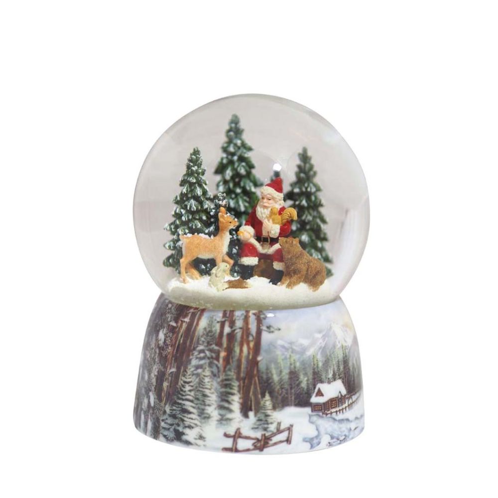Snow globe Santa in the forest. Santa sits in the globe filled with snow between a few wild animals and feeds them between the snowy fir trees. The base is painted with snowy forest scenes.