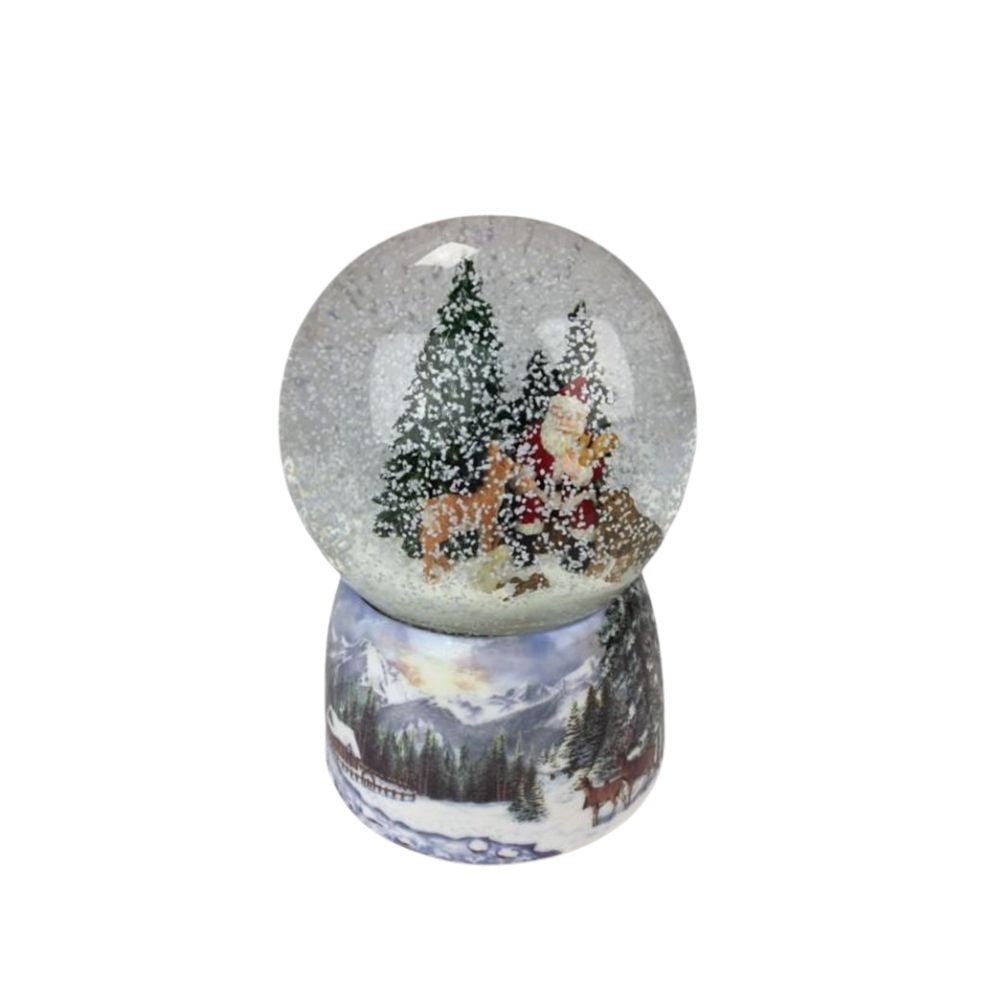 Snow globe Santa in the forest. Santa sits in the globe filled with snow between a few wild animals and feeds them between the snowy fir trees. The base is painted with snowy forest scenes.