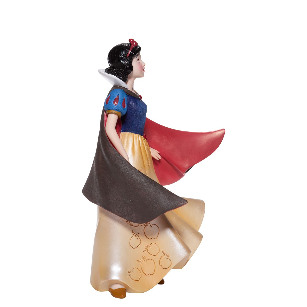 Snow White Couture de Force Figurine Snow White with her skin fair as snow and lips red as apples follows the wind on a new adventure fit for a princess. Hand-crafted and hand-painted, her iconic outfit shimmers in yellow satins and dark wool felts plussed with red faux gem stones.