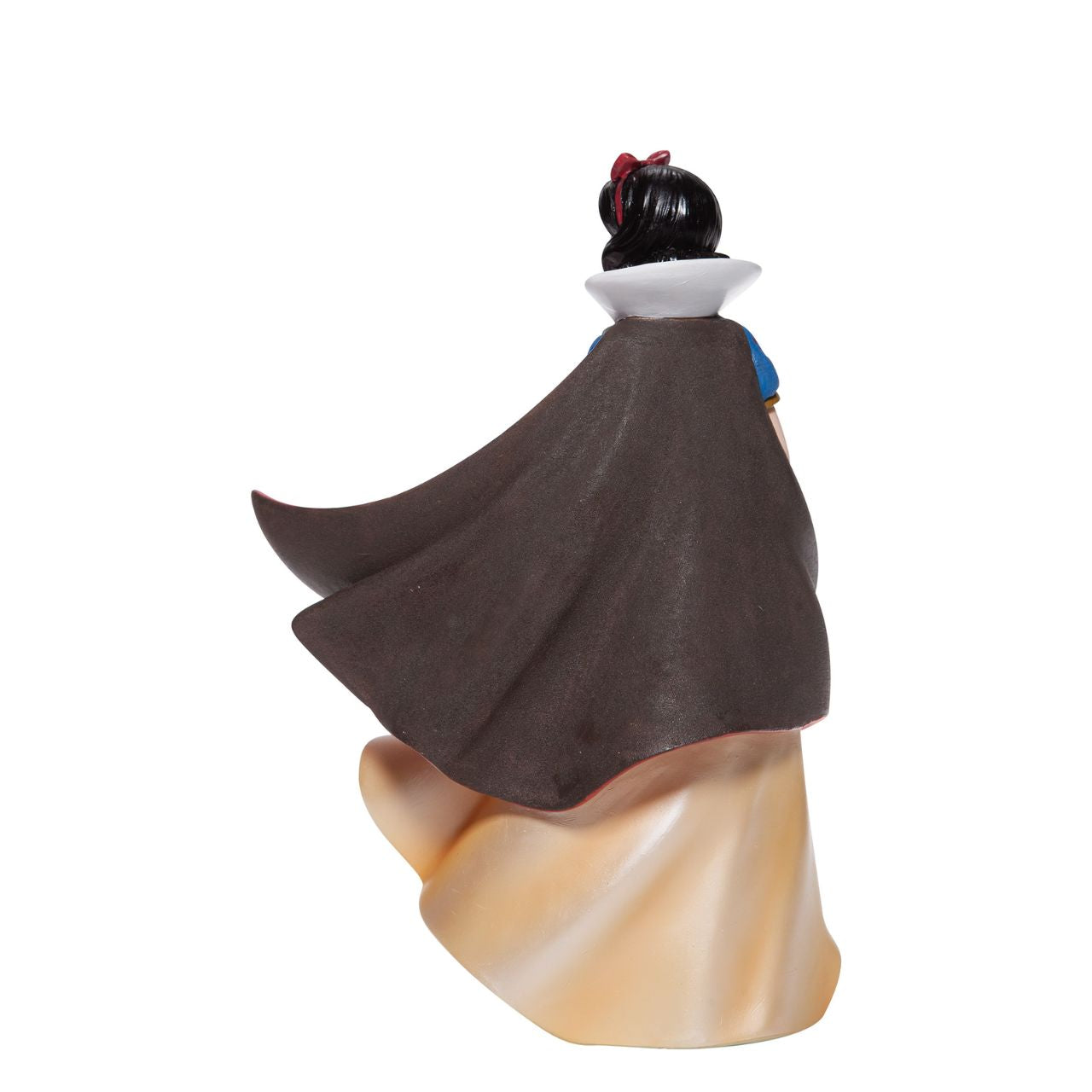 Snow White Couture de Force Figurine Snow White with her skin fair as snow and lips red as apples follows the wind on a new adventure fit for a princess. Hand-crafted and hand-painted, her iconic outfit shimmers in yellow satins and dark wool felts plussed with red faux gem stones.