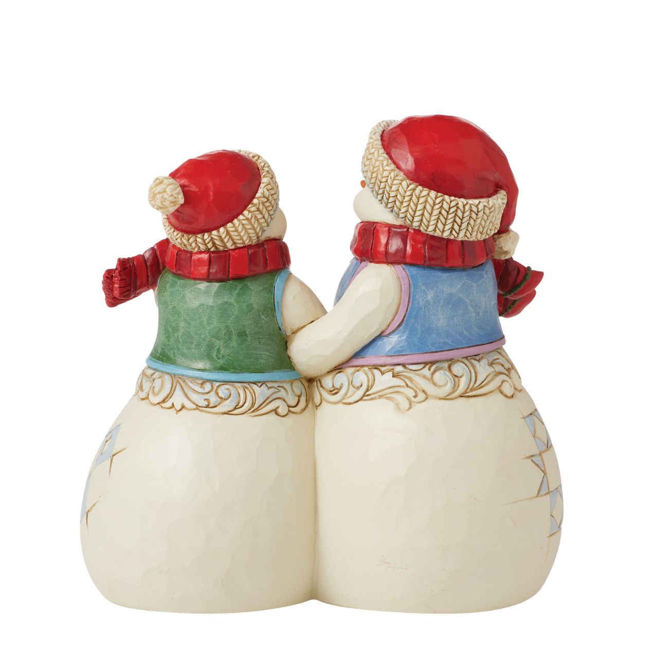 Heartwood Creek Christmas Collection Snowman Couple with Puppy Figurine Designed by award winning artist Jim Shore as part of the Heartwood Creek Christmas Collection, hand crafted using high quality cast stone and hand painted, this Snowman couple with their cute puppy is perfect for the Christmas season.