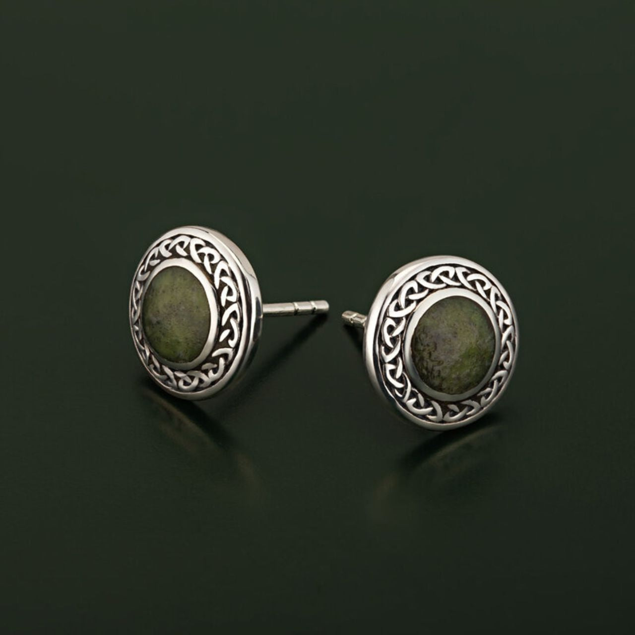 Sterling Silver Connemara Marble Round Celtic Stud Earrings These striking sterling silver stud earrings are made from Connemara marble, a unique stone that dates back over 900 million years and is known as “Ireland’s gemstone”.