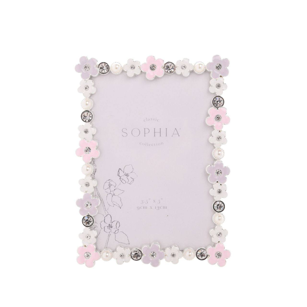 Introducing the Sophia Classic Daisy 3.5" x 5" Frame - Pastel, a delightfully charming piece that pairs perfectly with precious memories. Adorned with delicate white and pink flowers, it’s a treat for the eyes, while sparkling rhinestones add glamour.