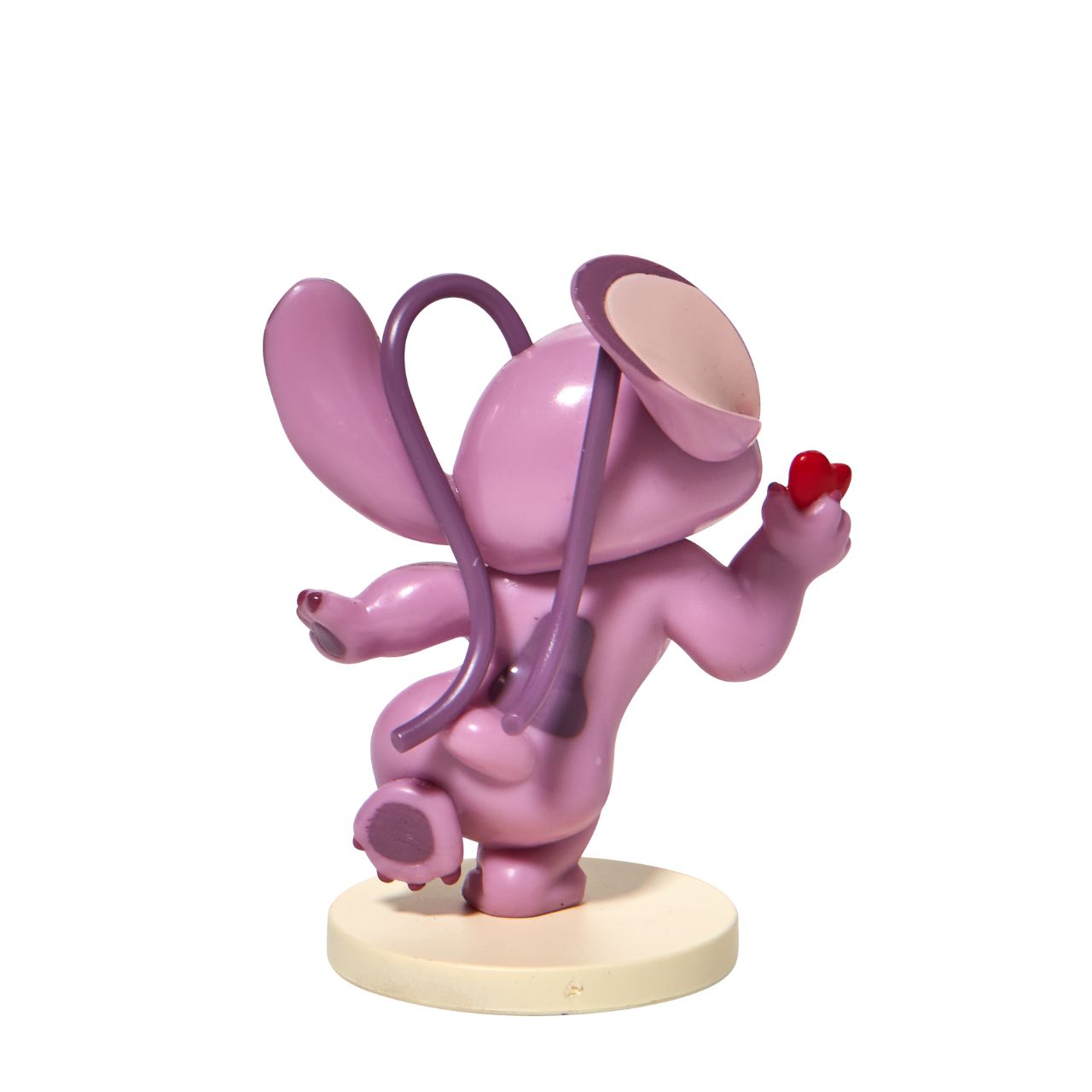Stitch Angel with Heart Mini Figurine This super cute Angel mini figurine is holding a little red heart just for you. Angel is the girlfriend of Stitch and is sweet and loving. This is the perfect addition to any Stitch or Disney collection. Made from high quality vinyl.