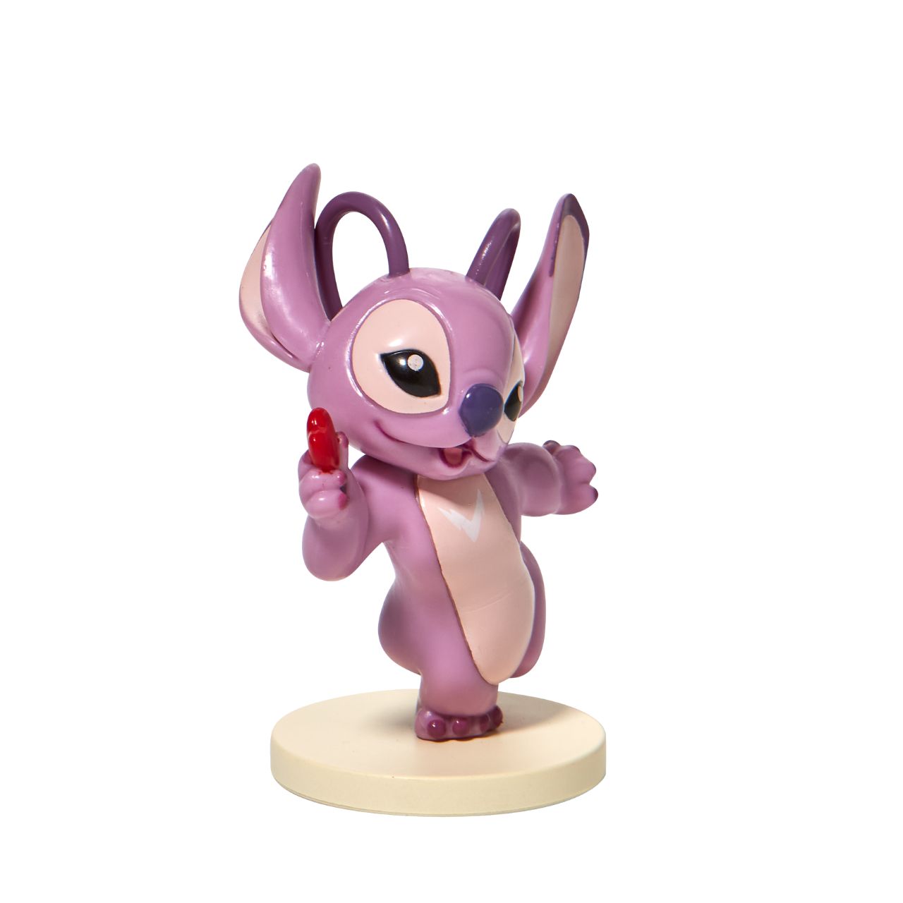 Stitch Angel with Heart Mini Figurine This super cute Angel mini figurine is holding a little red heart just for you. Angel is the girlfriend of Stitch and is sweet and loving. This is the perfect addition to any Stitch or Disney collection. Made from high quality vinyl.
