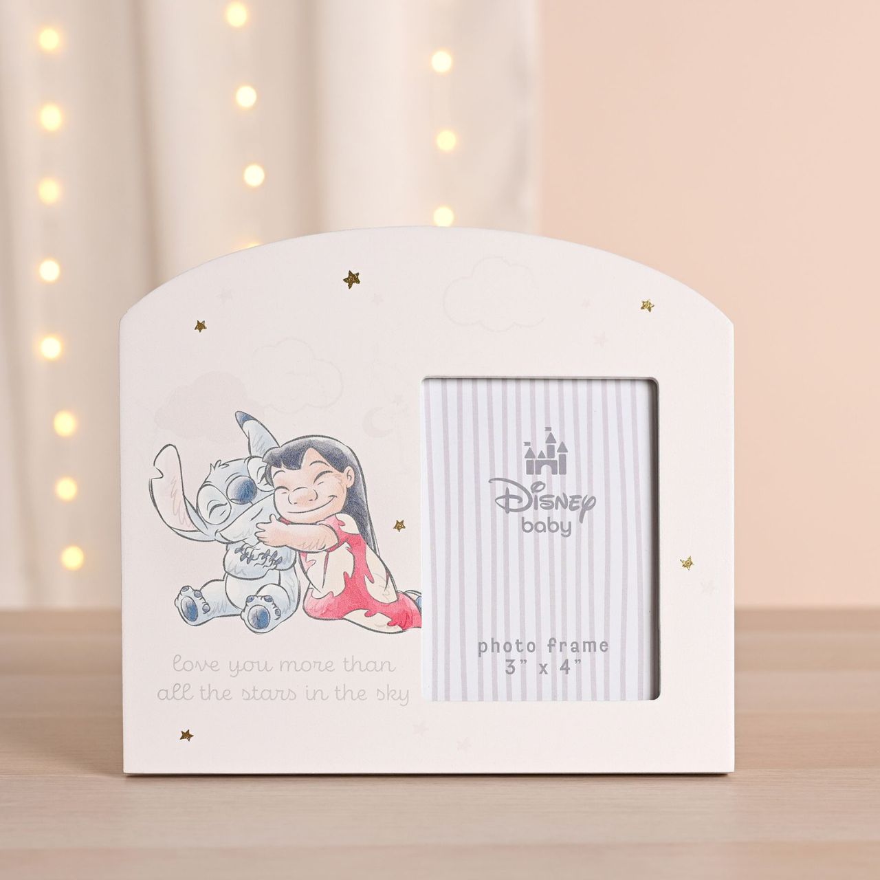 The Stitch Baby Frame is playful pink photo frame showcases a heart-warming cartoon of everyone's favourite Disney alien.