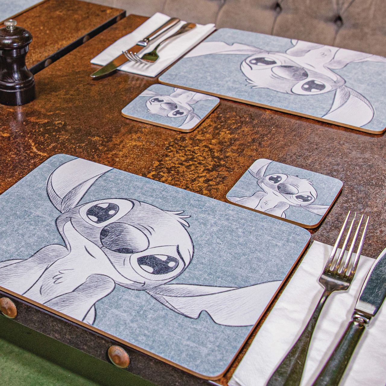 626 Flavours Stitch Placemats Set of 4 These set of 4 placemats are ideal for making those evening dinners with your family and friends even more fun. These Stitch melamine placemats come with a cork backing and are coated so are stain, scuff and heat resistant, ensuring your dining table and surfaces around your home are protected in style - no matter where you wish to set down your plate.