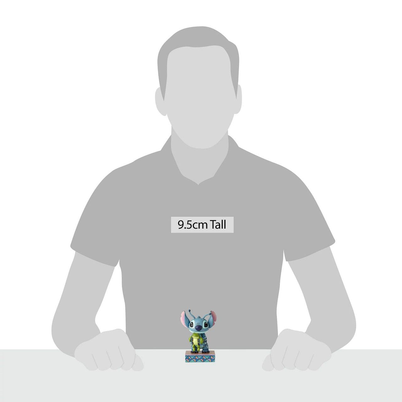 Jim Shore Strange Life-Forms Stitch with Frog Figurine Almost too cute to handle, this handcrafted design shows Stitch holding Frog just moments after he saved the little guy's life.