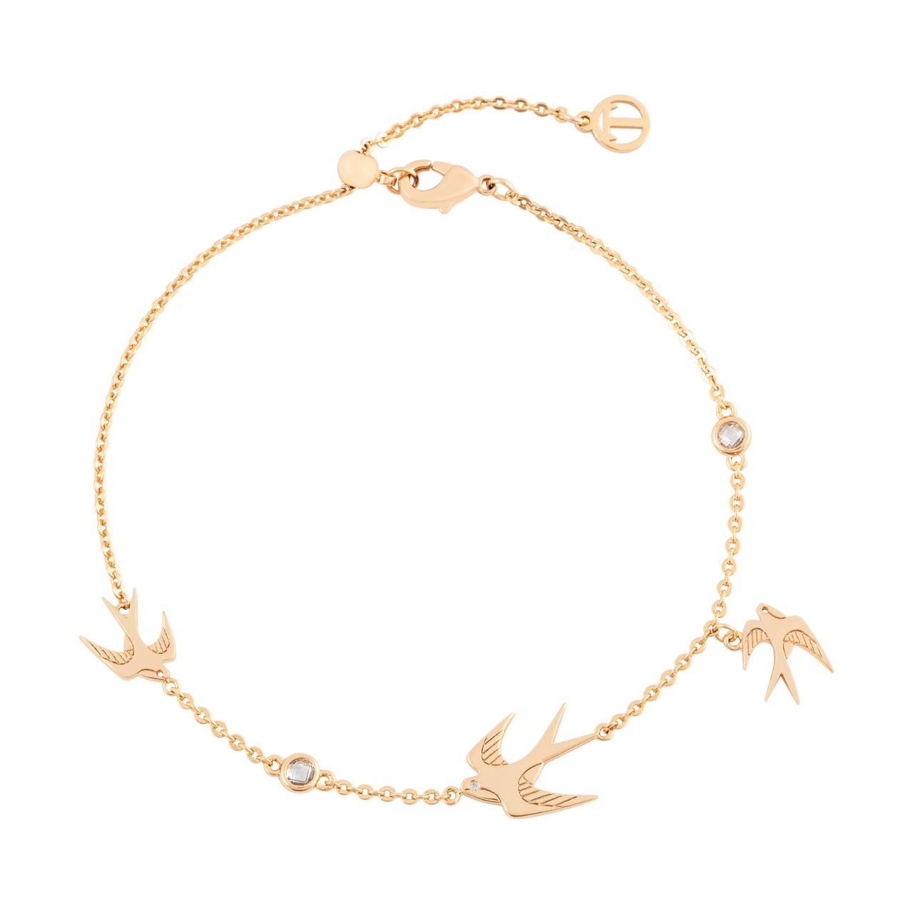 The Swallow Bracelet 3 Swallows & Clear CZ - Gold is a stunning piece that captures the essence of freedom and grace. This bracelet features three elegantly flying swallows, symbolizing the spirit of adventure and new beginnings.