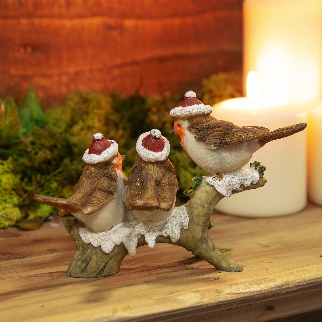 A hand painted three robins on a branch figurine. From the Enchanted Forest collection by Santa's Workshop - create your own winter wonderland.