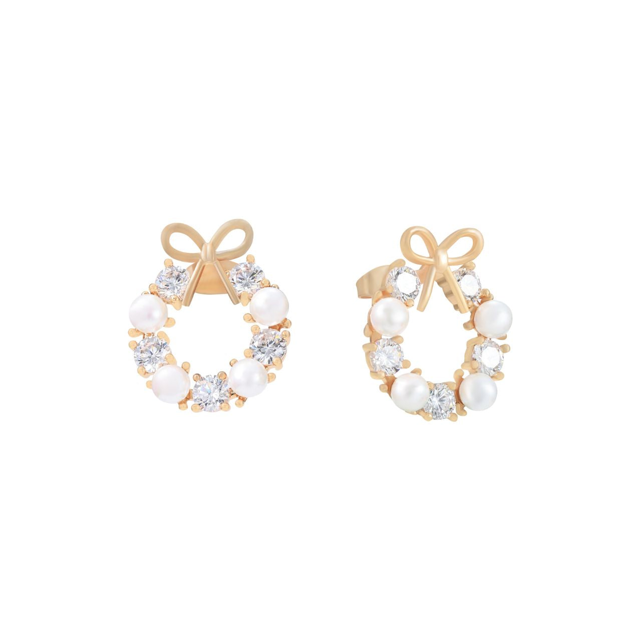 Elevate your elegance with the Tipperary Bow Pearl & CZ Earrings in Gold. Expertly crafted, these earrings combine lustrous pearls with sparkling cubic zirconia accents, creating a refined accessory that complements both formal and everyday styles.