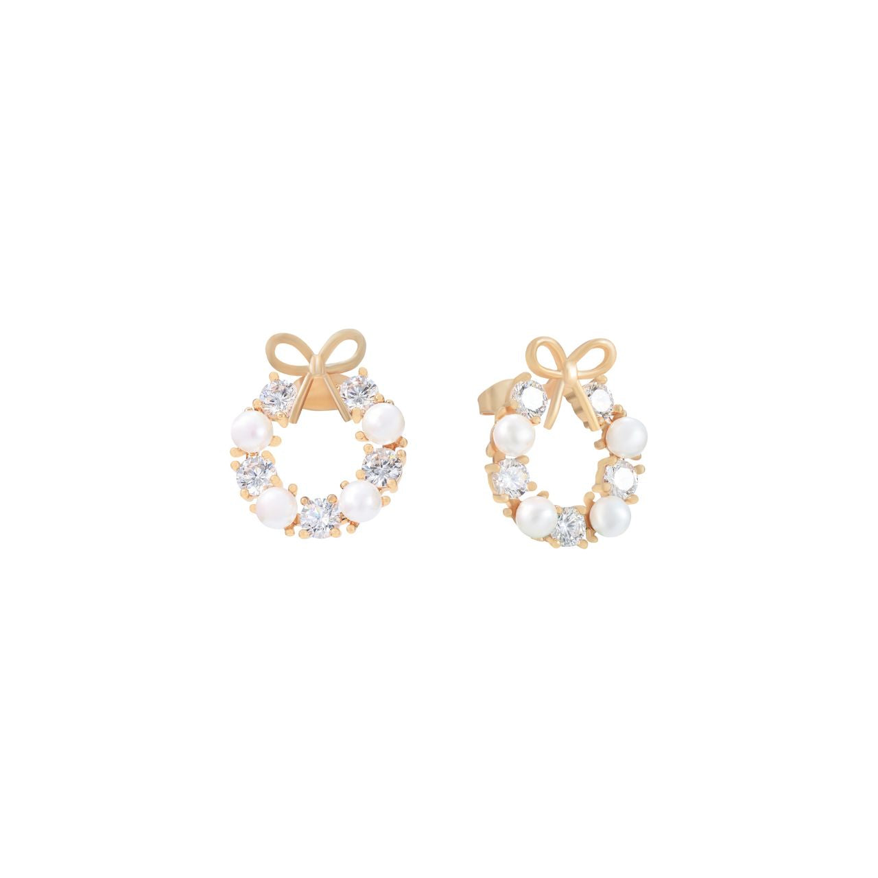 Elevate your elegance with the Tipperary Bow Pearl & CZ Earrings in Gold. Expertly crafted, these earrings combine lustrous pearls with sparkling cubic zirconia accents, creating a refined accessory that complements both formal and everyday styles.