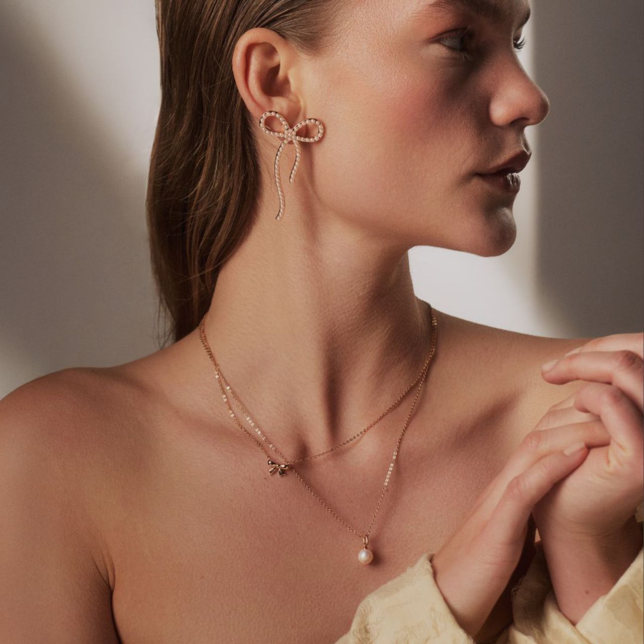 Delicate yet powerful, the bow has long been a symbol of love, unity and effortless sophistication. Our Bow Collection celebrates this timeless motif with exquisite craftmanship and refined beauty.