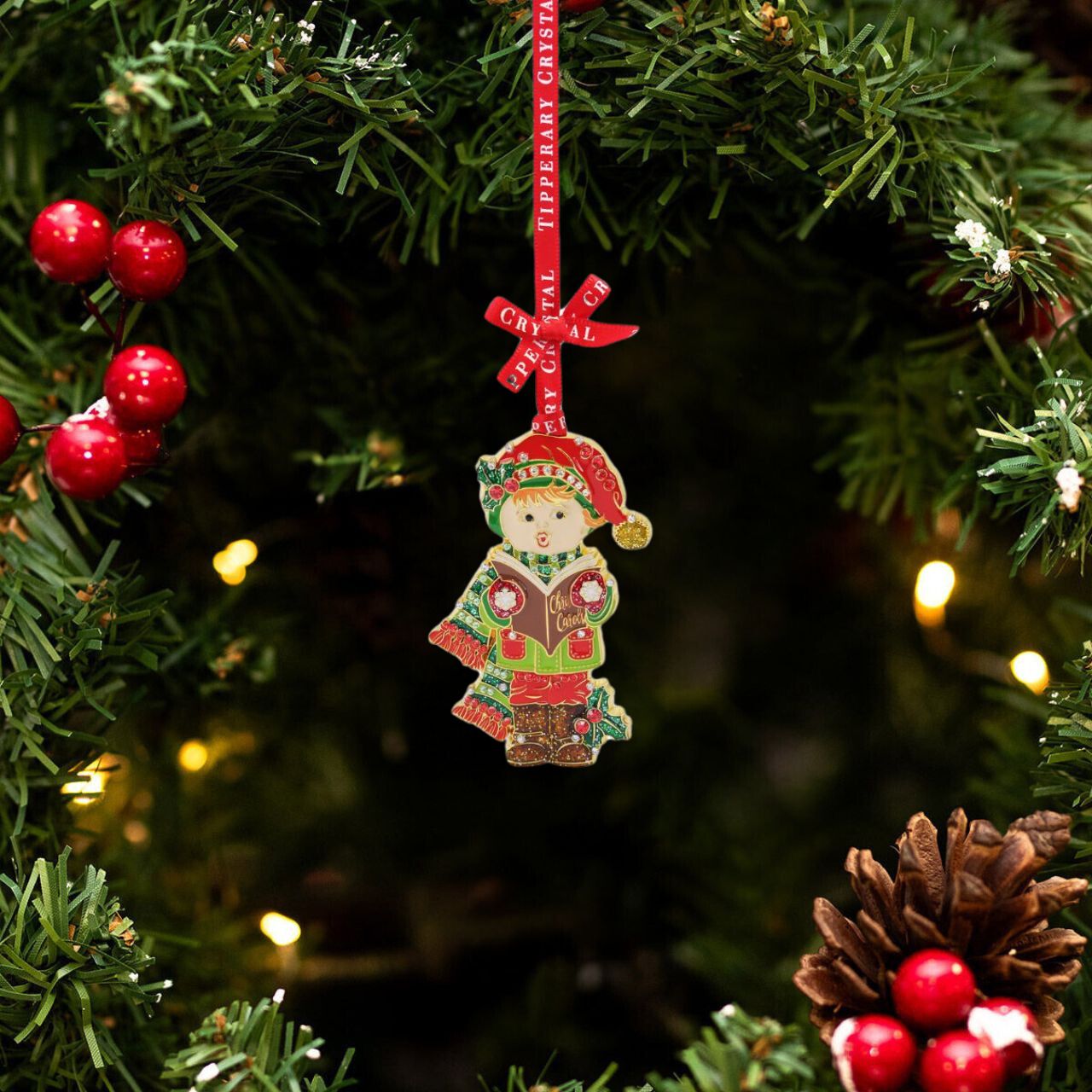 Enhance your holiday décor with the Tipperary Carol Singer Sparkle Christmas Decoration. Made by the renowned brand Tipperary, this decoration features a festive carol singer design that will add a touch of sparkle to any room. Crafted with high-quality materials, it is a timeless piece that will bring joy and elegance to your Christmas festivities.