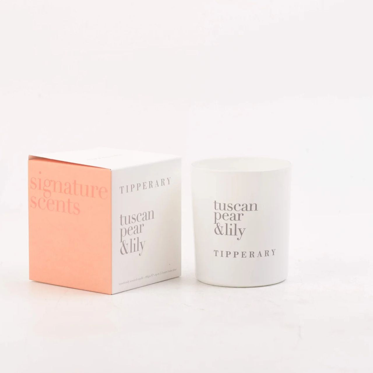 The Tipperary Signature Scents Tuscan Pear and Lily 180gm Candle brings a delightful fragrance to any space with its pleasant blend of scents.