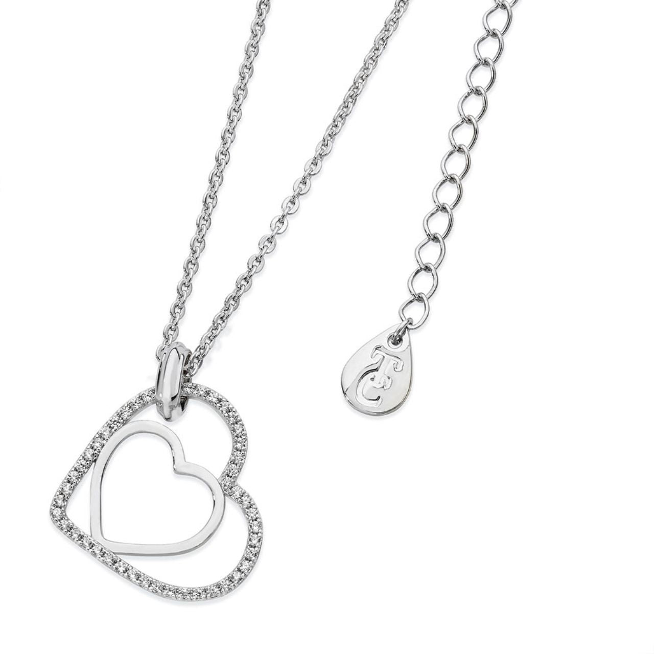Floating Heart Pendant Silver by Tipperary Crystal Especially for the one you love this meaningful design is styled in sleek silver. It features two open hearts - one smaller polished silver heart set inside the larger outline heart with a glittering border of clear crystal accents. This captivating pendant is finished with a brightly polished bale and suspends freely at a tilt along a cable chain which secures with a lobster claw clasp with 2” extension and a TC branded fob.
