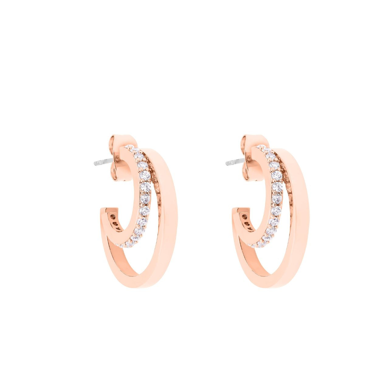 Elevate your elegance with the Tipperary Double C Earrings in rose gold. These refined earrings showcase a delicate intertwined double C design, perfectly crafted to add a subtle yet striking touch of sophistication to any outfit.