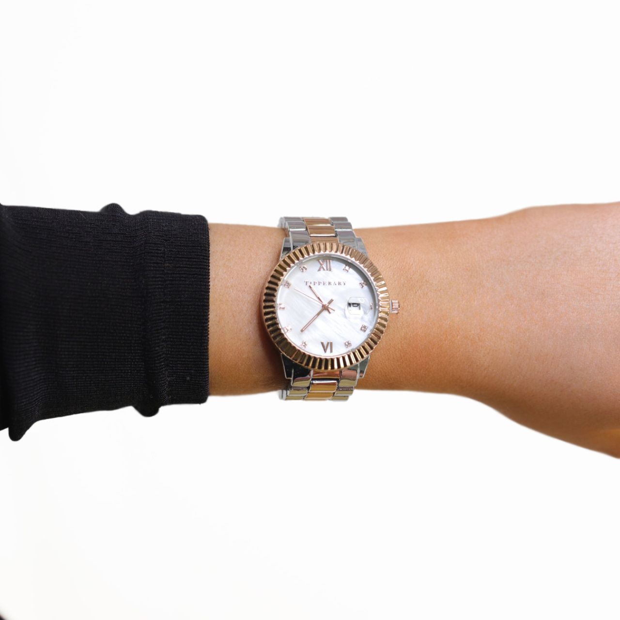 Crafted by the designers at Tipperary, A harmonious blend of classic and contemporary style, the Grenadier Ladies Watch is a true standout. Featuring a polished silver-tone case with a refined rose gold bezel, it’s paired with a matching two-tone band - silver with a striking rose gold centre link.