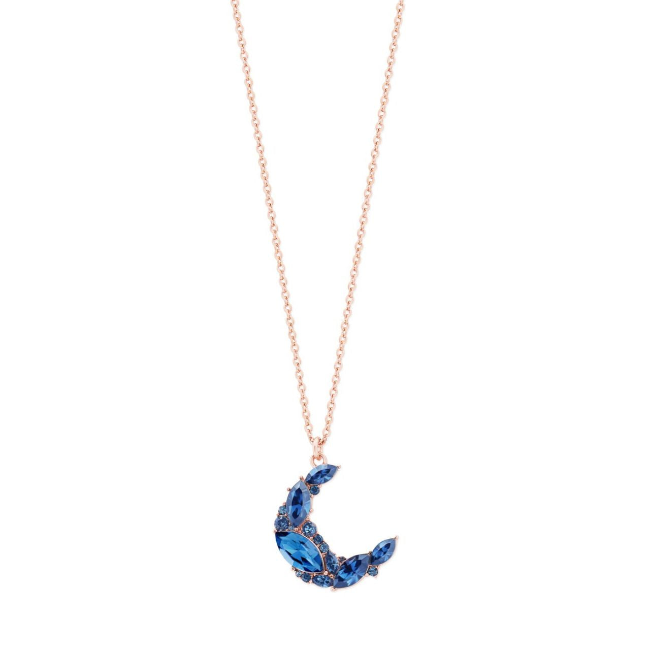 Half Moon Pendant Sapphire - Rose Gold by Tipperary Inspired by the hypnotic energy of the glowing moon, this collection is contemporary and minimalist yet luxuriously adorned with the clearest sparkling stones.