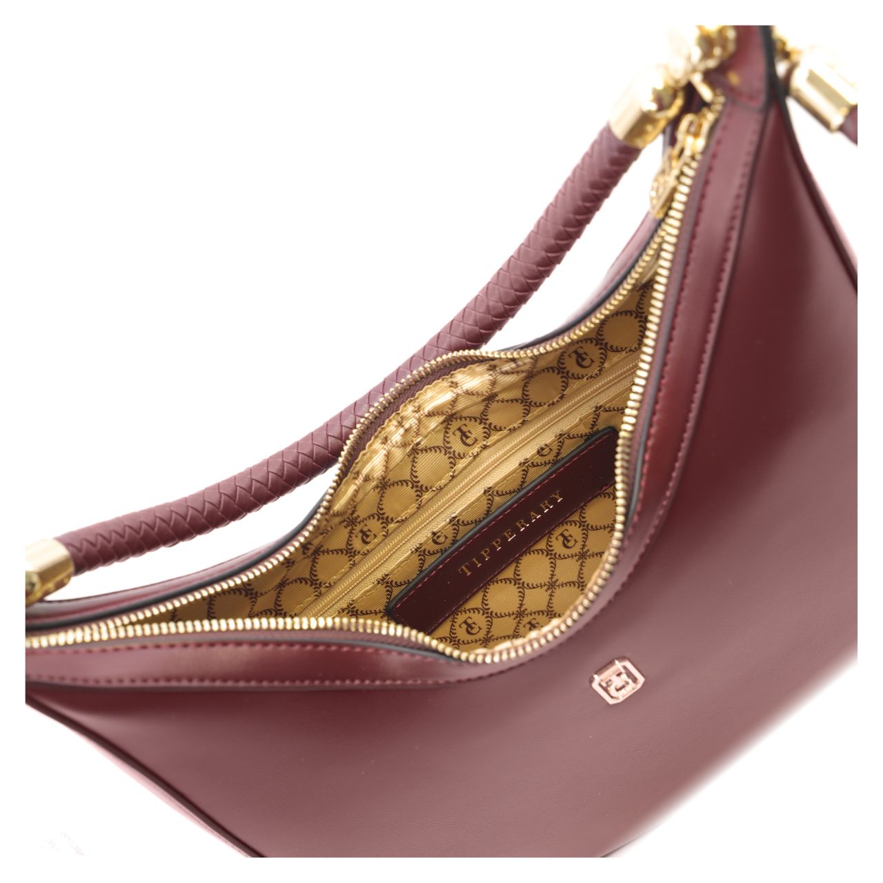 The Tipperary Moon Handbag in Burgundy offers a refined blend of style and practicality for summer 2025. Crafted with attention to detail, its sleek silhouette and warm Burgundy hue complement a variety of outfits, making it an essential accessory for the season.